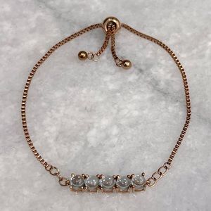 Sky Blue Topaz ION Plated 18K RG BOLO Bracelet